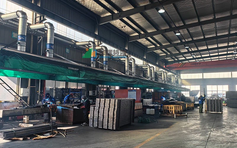 Workshop raw material area with stacked metal sheets Workshop raw material area with stacked metal sheets